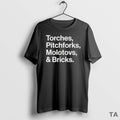 Top Torches Pitchforks Molotovs And Bricks 2025 World Tour T Shirt Sweater